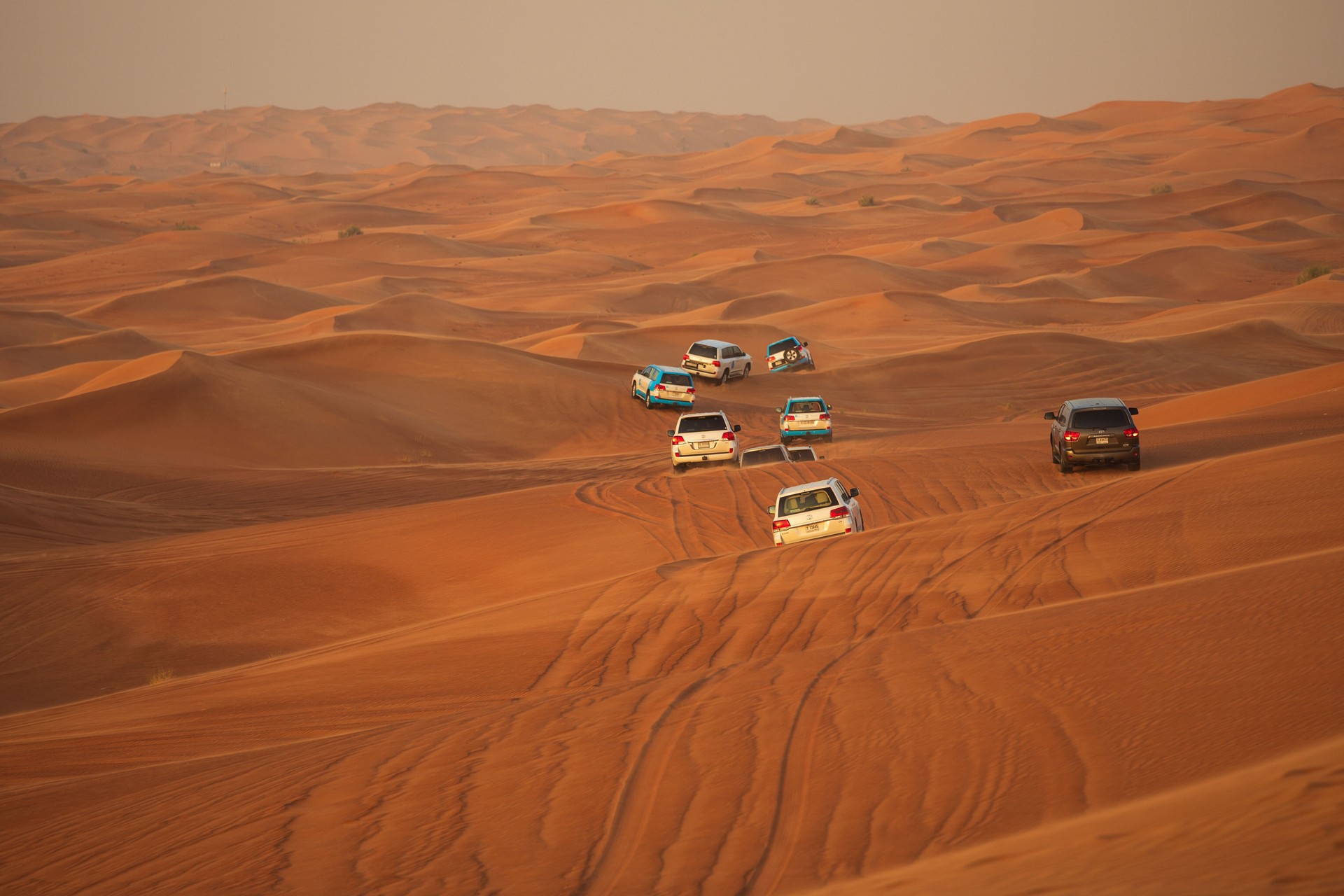 Dune bashing and off-road adventure with 4x4  vehicles in desert safari